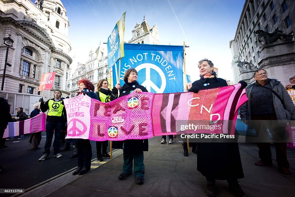 Hundreds of protesters gather outside the Ministry of...