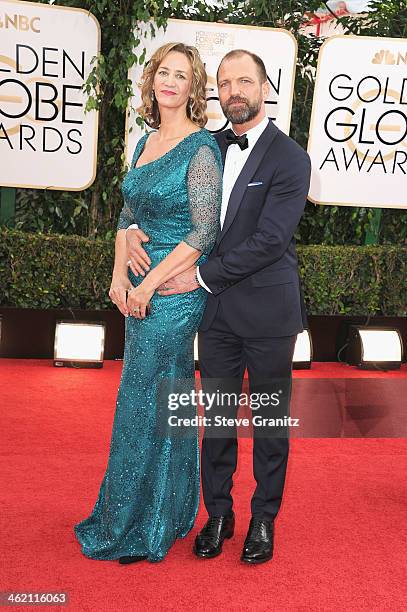 Actress Janet McTeer and Joe Coleman attend the 71st Annual Golden Globe Awards held at The Beverly Hilton Hotel on January 12, 2014 in Beverly...