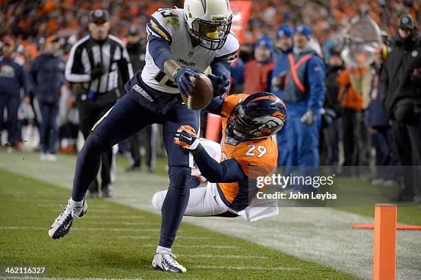 San Diego Chargers wide receiver Keenan Allen reaches out for the end zone for a touchdown pass Denver Broncos free safety Michael Huff during the...