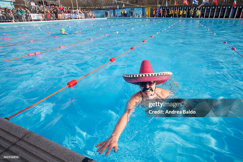 People take part in the 6th edition of the swimming race UK...