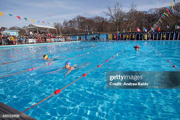 People take part in the 6th edition of the swimming race UK Cold Water Swimming Championship at the Tooting Bec Lido.