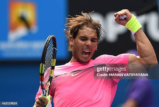 Spain's Rafael Nadal celebrates after victory in his men's singles match against South Africa's Kevin Anderson on day seven of the 2015 Australian...