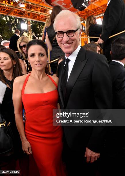 71st ANNUAL GOLDEN GLOBE AWARDS -- Pictured: Actress Julia Louis-Dreyfus and writer Brad Hall arrive to the 71st Annual Golden Globe Awards held at...