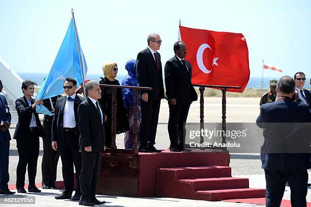Turkish President Recep Tayyip Erdogan and Somalian President Hassan Sheikh Mohamoud are seen during an official welcoming ceremony at the airport in...