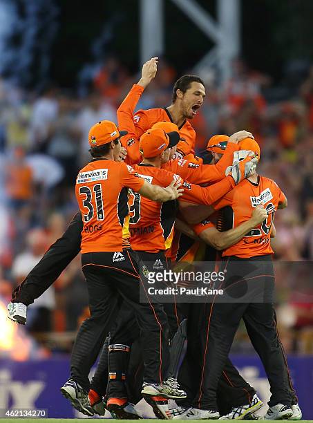 The Scorchers celebrate after defeating the Stars during the Big Bash League Semi Final match between the Perth Scorchers and the Melbourne Stars at...