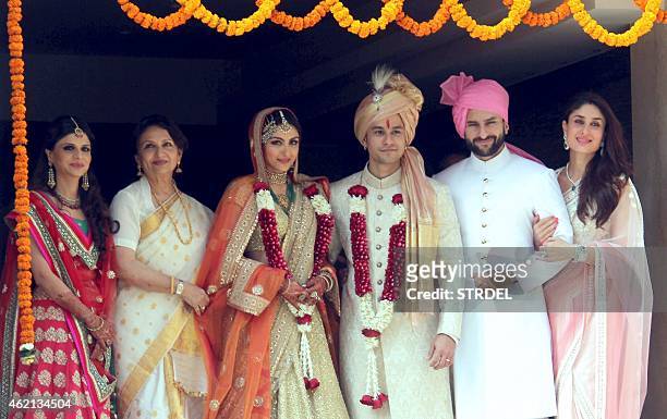 Saba Ali Khan , Sharmila Tagore , Saif Ali Khan , and Kareena Kapoor Khan pose during the wedding of Soha Ali Khan and Kunal Khemu in Mumbai on...