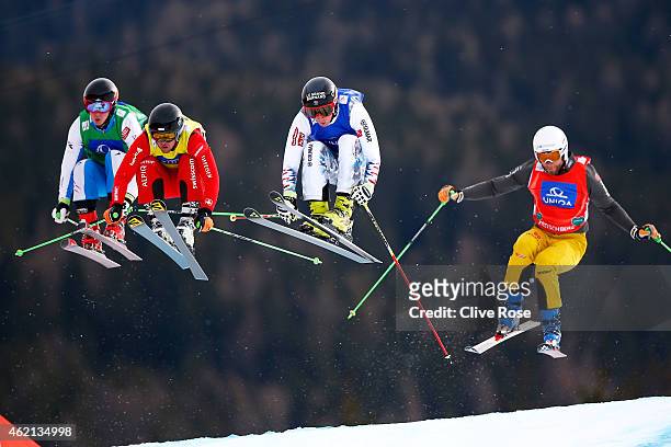 Johannes Rohrweck of Austria, Marc Bischofberger of Switzerland, Jonathan Midol of France and Andreas Schauer of Germany compete in the Men's Ski...