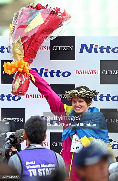 Tatiana Gamera of Russia celebrates winning the 2015 Osaka Women's Marathon at Nagai Stadium on January 25, 2015 in Osaka, Japan.