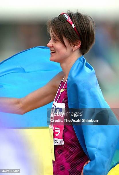 Tatiana Gamera of Russia smiles to celebrate winning the 2015 Osaka Women's Marathon at Nagai Stadium on January 25, 2015 in Osaka, Japan.