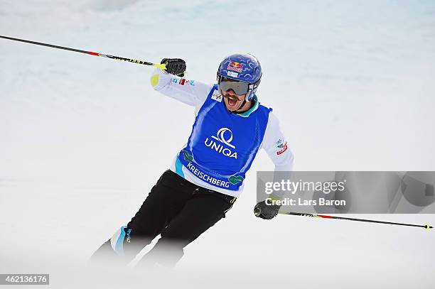 Filip Flisar of Slovenia celebrates winning gold in the Big Final of the Men's Ski Cross Finals during the FIS Freestyle Ski and Snowboard World...