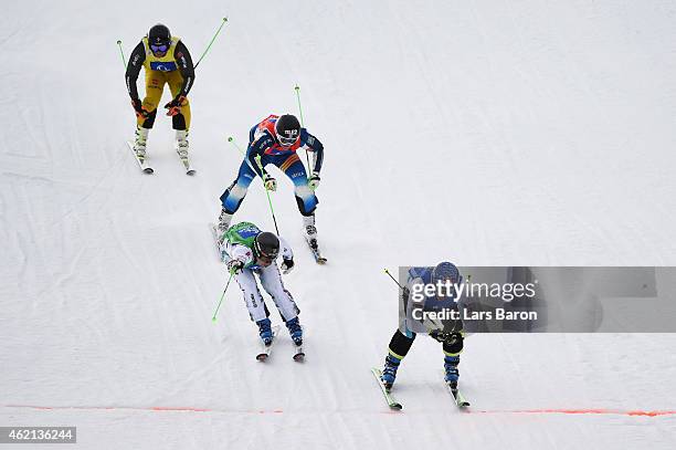 Filip Flisar of Slovenia crosses the finish line to win the gold in the Big Final of the Men's Ski Cross Finals during the FIS Freestyle Ski and...