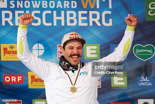 Gold medalist Filip Flisar of Slovenia celebrates after receiving the gold medal won in the Men's Ski Cross Finals during the FIS Freestyle Ski and...