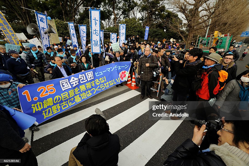 People in Tokyo protest against U.S. military bases in Okinawa