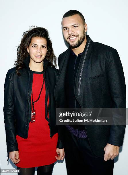 Tennis player Jo-Wilfried Tsonga and Noura El Shwekh attend the Y-3 Menswear Fall/Winter 2015-2016 Show as part of Paris Fashion Week on January 25,...