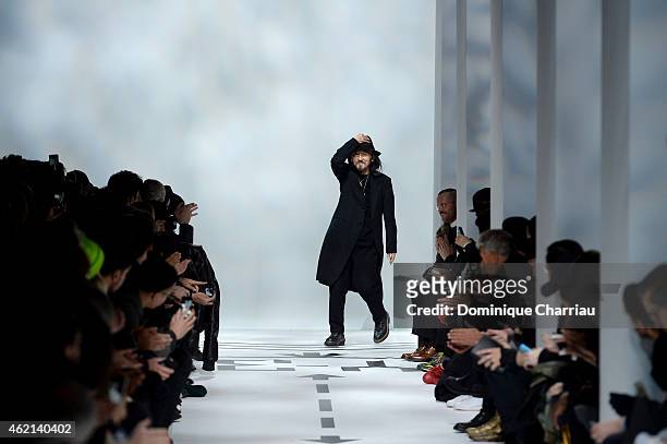 Designer Yohji Yamamoto acknowledges the applause of the audience after the Y-3 Menswear Fall/Winter 2015-2016 show as part of Paris Fashion Week on...