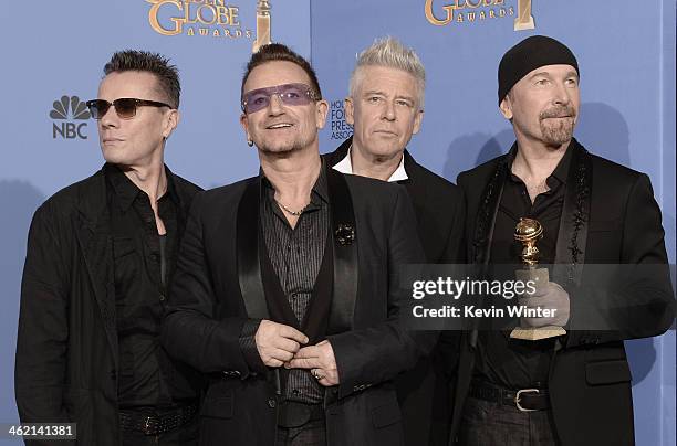 Musicians Larry Mullen Jr., Bono, Adam Clayton and The Edge of U2, winners of Best Original Song for 'Ordinary Love' from 'Mandela: Long Walk to...