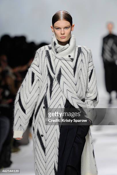 Model walks the runway during the Y-3 Menswear Fall/Winter 2015-2016 show as part of Paris Fashion Week at Couvent des Cordeliers on January 25, 2015...