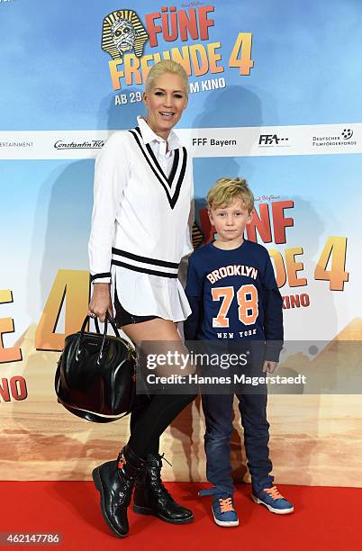 Sarah Kern with her son Romeo attend the premiere of the film 'Fuenf Freunde 4' at Cinemaxx on January 25, 2015 in Munich, Germany.