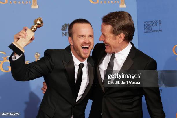 Actors Aaron Paul and Bryan Cranston pose in the press room during the 71st Annual Golden Globe Awards held at The Beverly Hilton Hotel on January...
