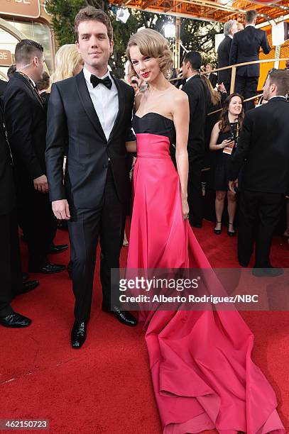 71st ANNUAL GOLDEN GLOBE AWARDS -- Pictured: Austin Swift and singer Taylor Swift arrive to the 71st Annual Golden Globe Awards held at the Beverly...