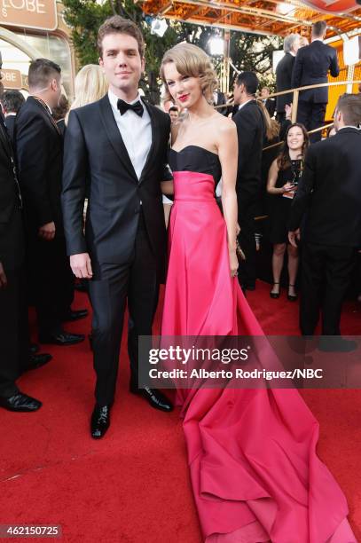 71st ANNUAL GOLDEN GLOBE AWARDS -- Pictured: Austin Swift and singer Taylor Swift arrive to the 71st Annual Golden Globe Awards held at the Beverly...