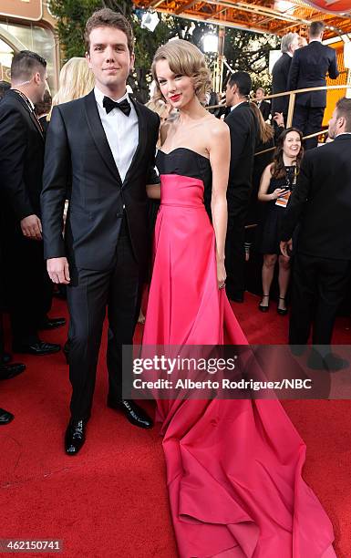 71st ANNUAL GOLDEN GLOBE AWARDS -- Pictured: Austin Swift and singer Taylor Swift arrive to the 71st Annual Golden Globe Awards held at the Beverly...