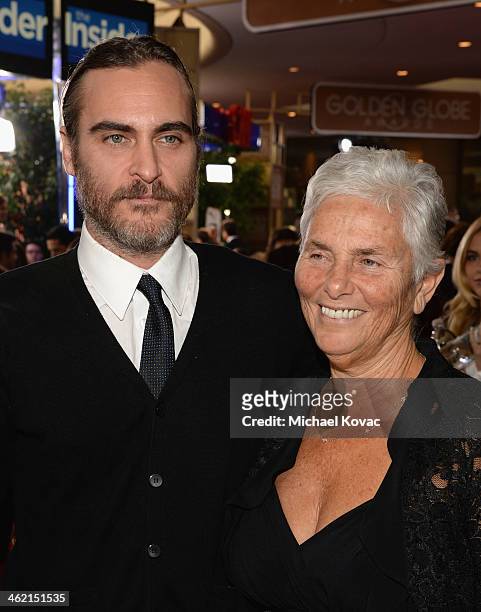 Actor Joaquin Phoenix and Arlyn Phoenix attend the 71st Annual Golden Globe Awards with Moet & Chandon held at the Beverly Hilton Hotel on January...
