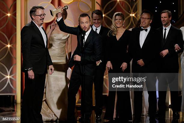 In this handout photo provided by NBCUniversal, Vince Gilligan, Anna Gunn, Aaron Paul, Michelle MacLaren and Mark Johnson accept the award for Best...