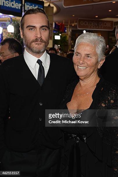 Actor Joaquin Phoenix and Arlyn Phoenix attend the 71st Annual Golden Globe Awards with Moet & Chandon held at the Beverly Hilton Hotel on January...