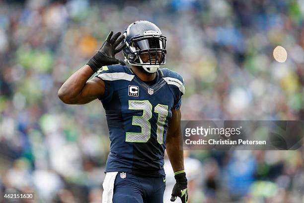 Strong safety Kam Chancellor of the Seattle Seahawks reacts in the 2015 NFC Championship game against the Green Bay Packers at CenturyLink Field on...