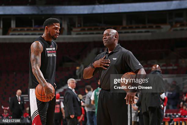 Udonis Haslem and assistant coach Keith Smart of the Miami Heat before the game against the Chicago Bulls on January 25, 2015 at the United Center in...