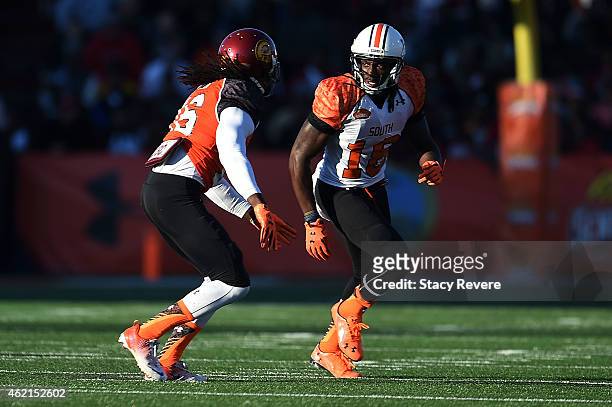 Sammie Coates of the South team works against Josh Shaw of the North team during the Reese's Senior Bowl at Ladd Peebles Stadium on January 24, 2015...