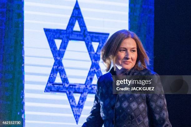 Former Israeli justice minister and HaTnuah party leader Tzipi Livni arrives to deliver a speech during an election campaign meeting in Tel Aviv, on...