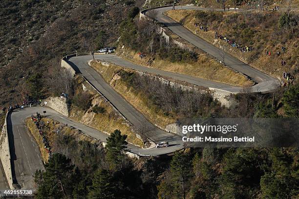 Sebastien Loeb of France and Daniel Elena of Monaco compete in their Citroen Total Abu Dhabi WRT Citroen DS3 WRC during Day Four of the WRC...