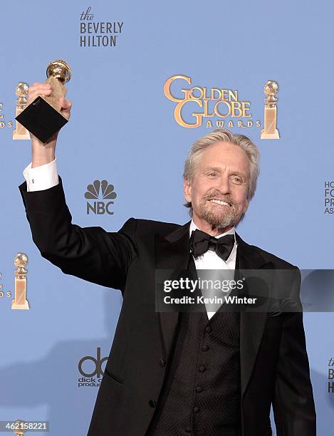 Actor Michael Douglas, winner of Best Actor in a Miniseries or Television Film for 'Behind the Candelabra,' poses in the press room during the 71st...