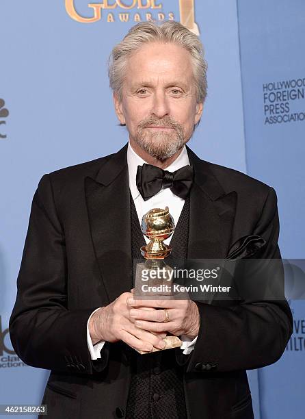 Actor Michael Douglas, winner of Best Actor in a Miniseries or Television Film for 'Behind the Candelabra,' poses in the press room during the 71st...