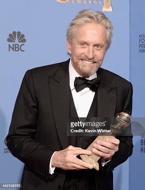 Actor Michael Douglas, winner of Best Actor in a Miniseries or Television Film for 'Behind the Candelabra,' poses in the press room during the 71st...