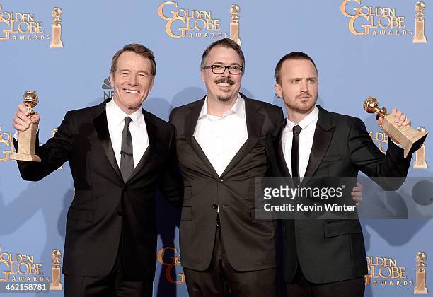 Actor Bryan Cranston, writer-producer Vince Gilligan, and actor Aaron Paul, winners of Best Series - Drama for 'Breaking Bad,' pose in the press room...
