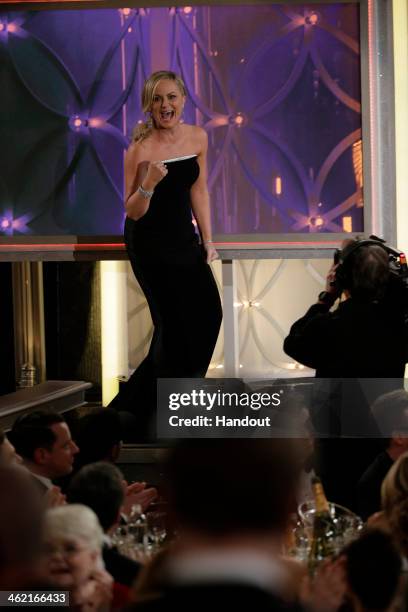 In this handout photo provided by NBCUniversal, Amy Poehler accepts the award for Best Actress - TV Series, Comedy or Musical for "Parks and...