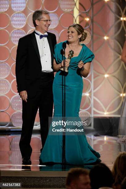 In this handout photo provided by NBCUniversal, Chris Buck and Jennifer Lee accept the award for Best Animated Feature Film for "Frozen" during the...