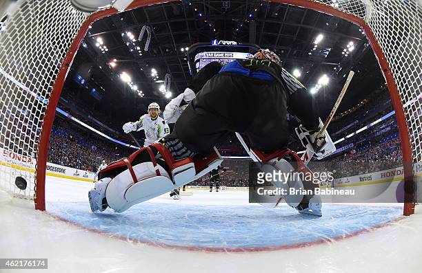 Jakub Voracek of the Philadelphia Flyers and Team Toews scores against goaltender Carey Price of the Montreal Canadiens and Team Foligno in the first...
