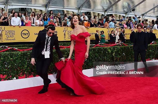 Actress Alysia Reiner arrives for the 21st Annual Screen Actors Guild Awards, January 25, 2015 at the Shrine Auditorium in Los Angeles, California....