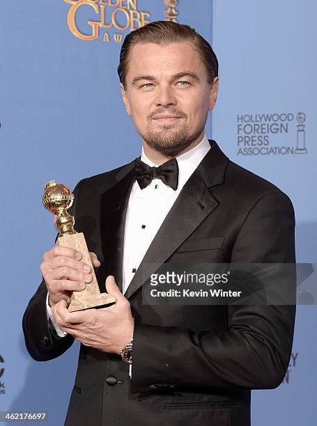 Actor Leonardo DiCaprio, winner of Best Actor in a Motion Picture - Musical or Comedy for 'The Wolf of Wall Street,' poses in the press room during...