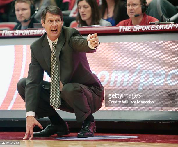 Head coach Ken Bone of the Washington State Cougars directs his team in the game against the Utah Runnin' Utes at Beasley Coliseum on January 12,...