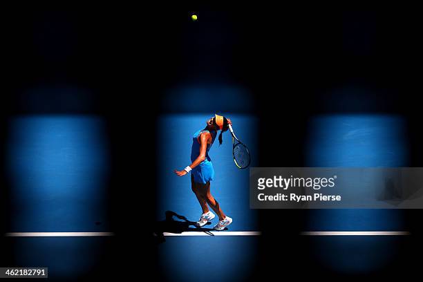 Ana Ivanovic of Serbia serves in her first round match against Kiki Bertens of the Netherlands during day one of the 2014 Australian Open at...
