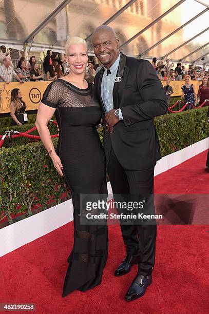 Personality Rebecca Crews and actor Terry Crews attend TNT's 21st Annual Screen Actors Guild Awards at The Shrine Auditorium on January 25, 2015 in...