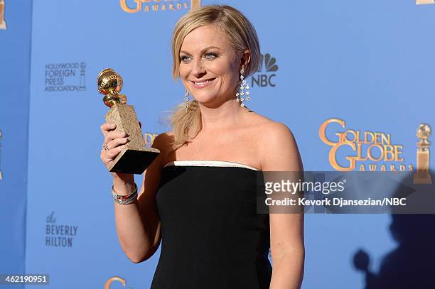 71st ANNUAL GOLDEN GLOBE AWARDS -- Pictured: Actress Amy Poehler, winner of Best Actress in a Television Series - Musical or Comedy for 'Parks and...