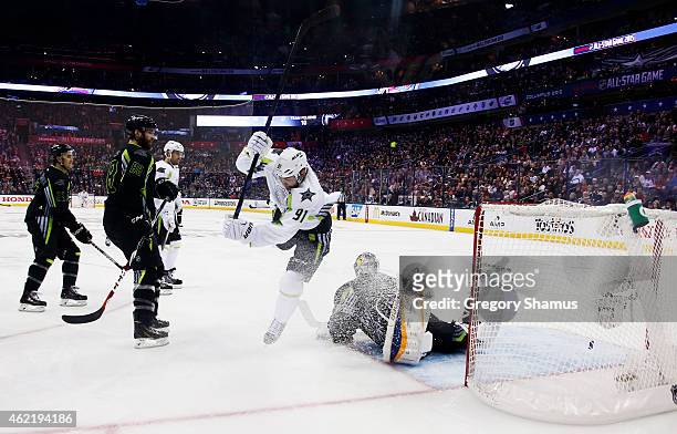 Tyler Seguin of the Dallas Stars and Team Toews scores a goal in the third period against Brian Elliott of the St. Louis Blues and Team Foligno...