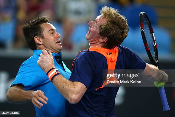 Todd Woodbridge of Australia and Mark Woodforde of Australia celebrates in their legends doubles match during day eight of the 2015 Australian Open...