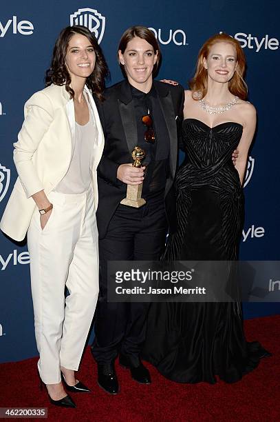 Producer Megan Ellison , winner of Best Motion Picture - Musical or Comedy for 'American Hustle,' actress Jessica Chastain and guest attend the 2014...